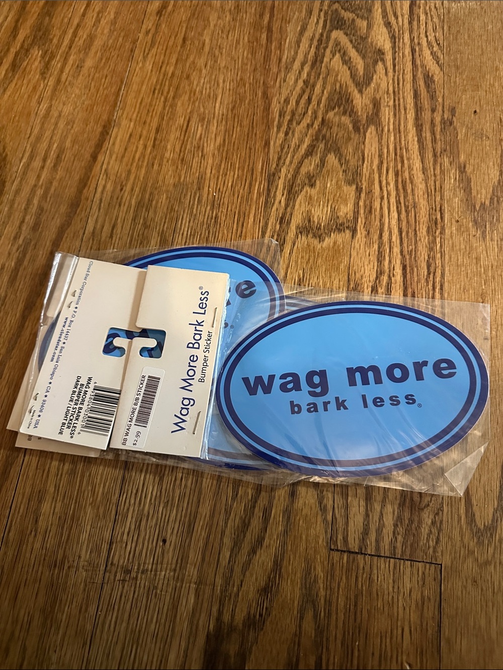 Wag More Bark Less Blue Oval Bumper Sticker